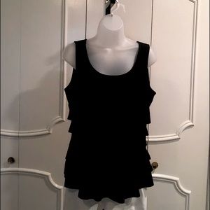 Ruffled front, flat back jersey top. Imported fabric.